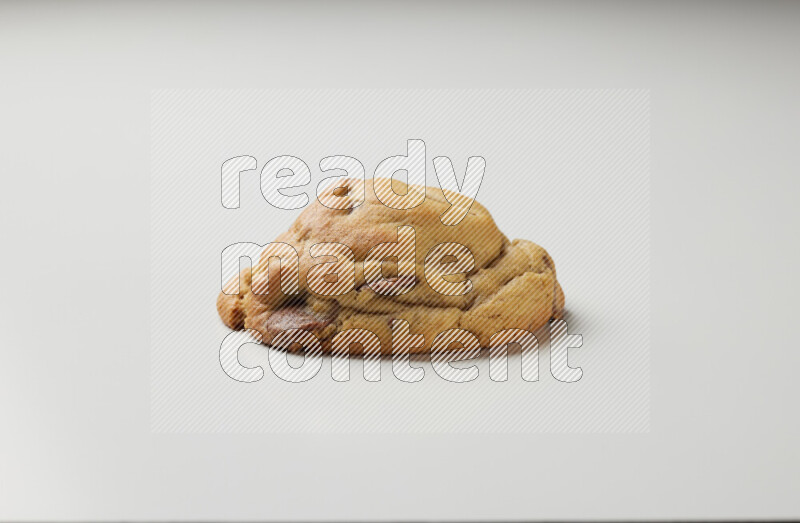 a chocolate chip cookie on a white background