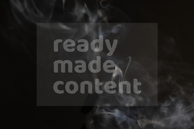 Motion of wavy smoke isolated on dark background