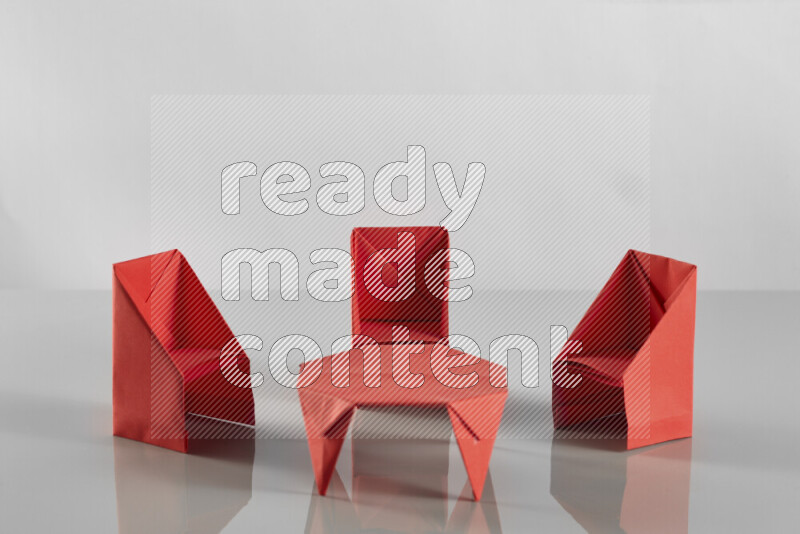 Origami dinning room on grey background