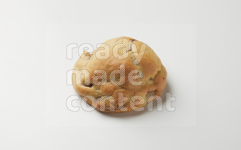 a chocolate chip cookie on a white background