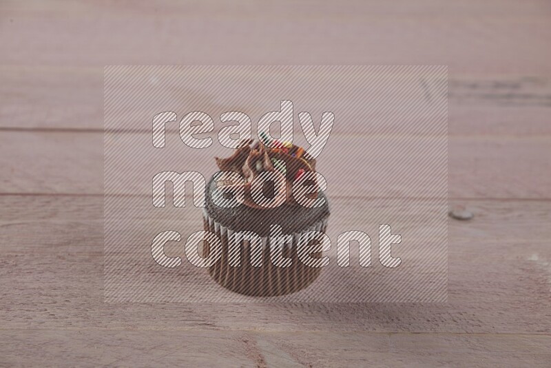 Chocolate mini cupcake topped with chocolate cream