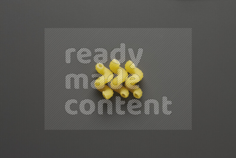 Twist pasta on grey background
