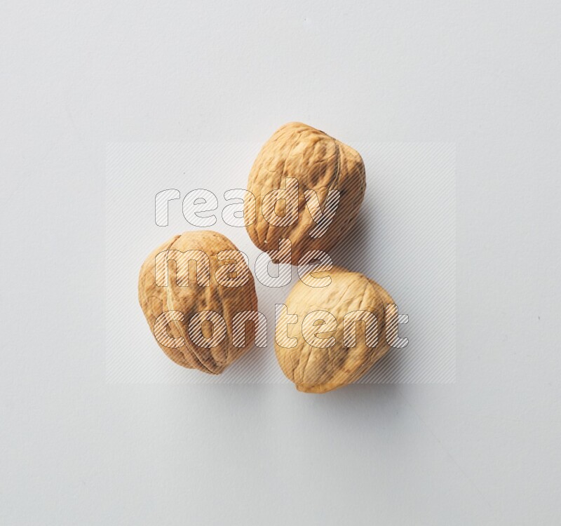 Top-view shot of walnut on white background