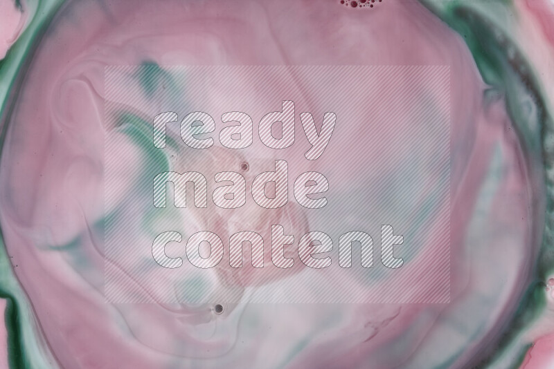 صورة مقربة لأنماط دوامية مجردة باللون الأحمر والأخضر