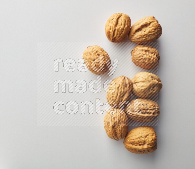 Top-view shot of walnut on white background