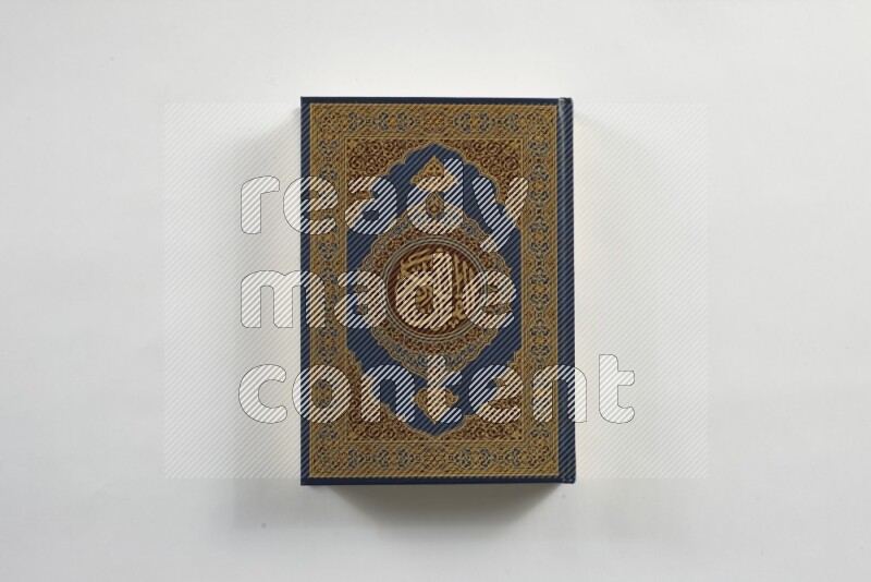 Quran with a prayer beads on white background