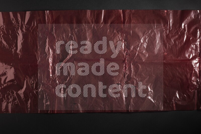 Colored plastic textures on black background