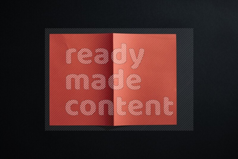 White paper sheet on black background