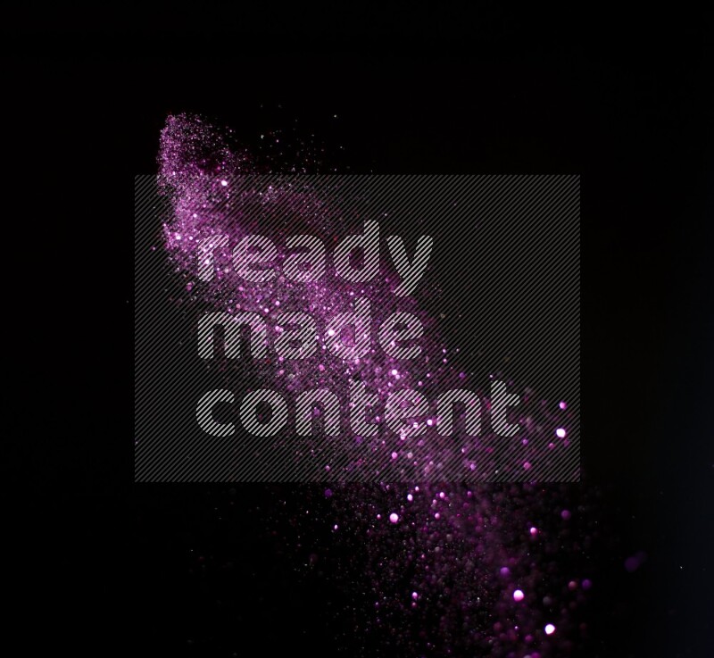 Pink glitter powder isolated on black background