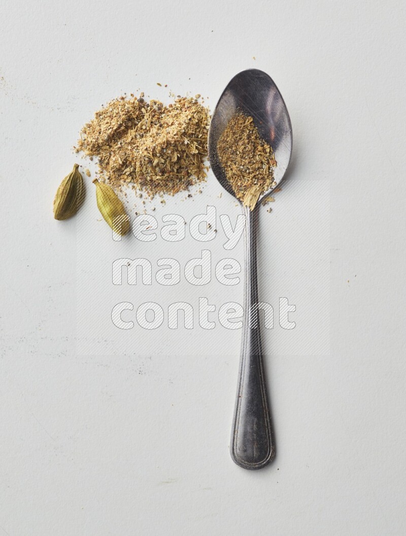 Top-view shot of Cardamon on white background