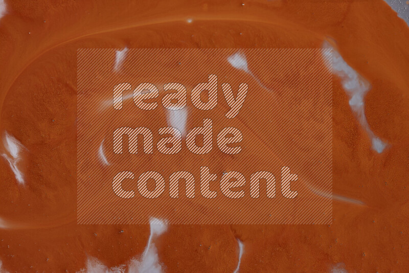 Close-ups of abstract orange paint texture in different shapes