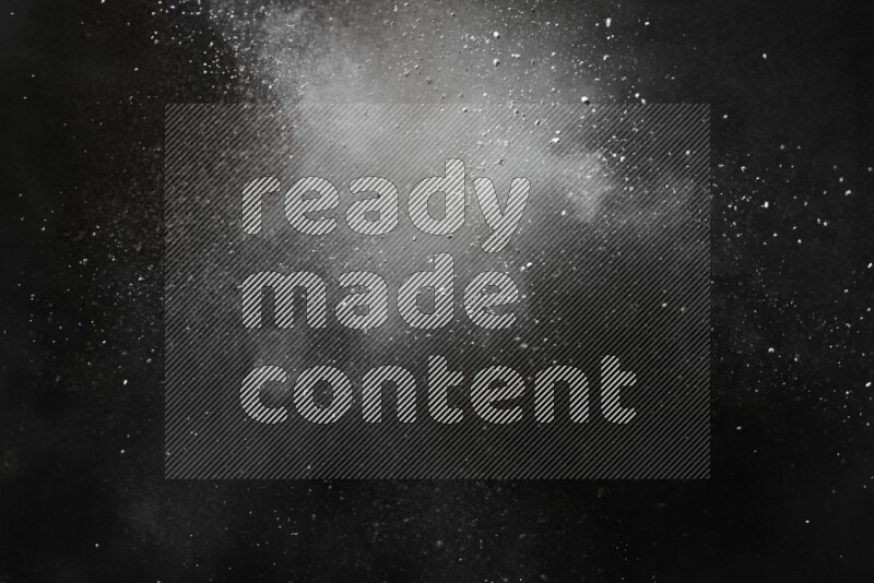 White powder explosion on black background