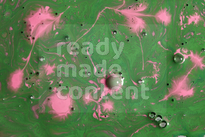Abstract colorful background with mixed of pink and green paint colors