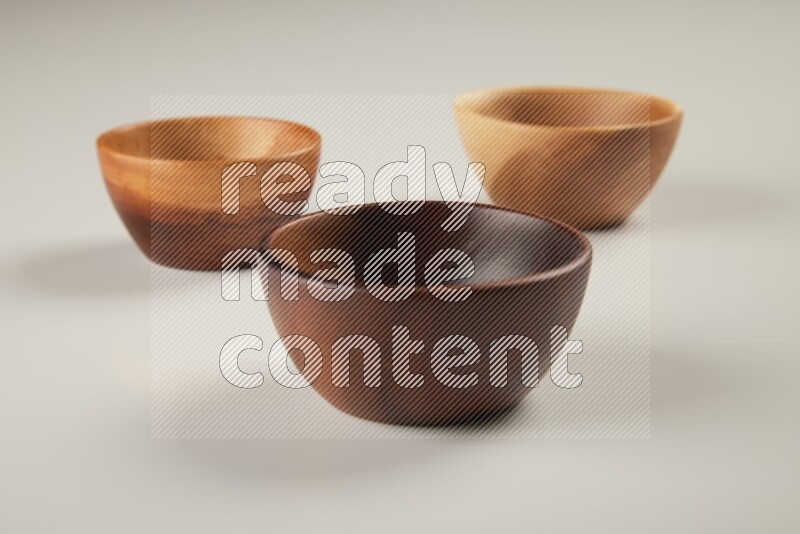 Wooden bowl on white background
