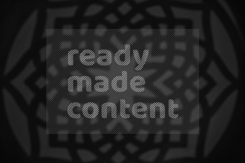 A collection of gobo light projections showcasing geometric patterns onto a smooth surface