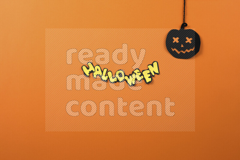 Halloween hand crafts on orange background