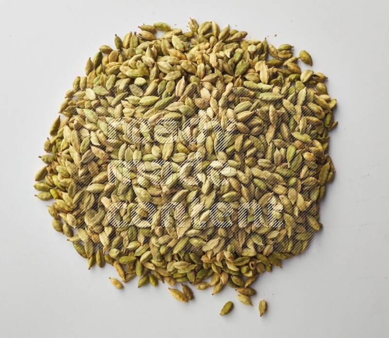 Top-view shot of Cardamon on white background