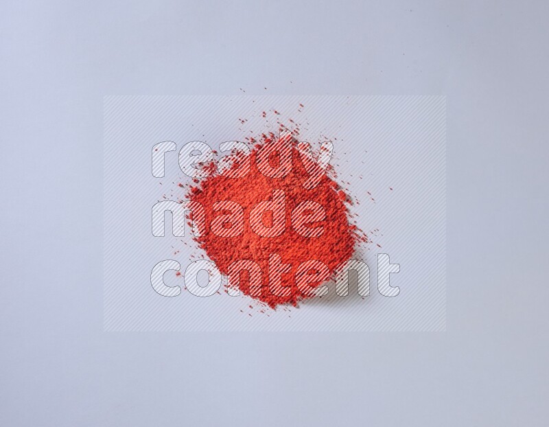 Red powder on white background