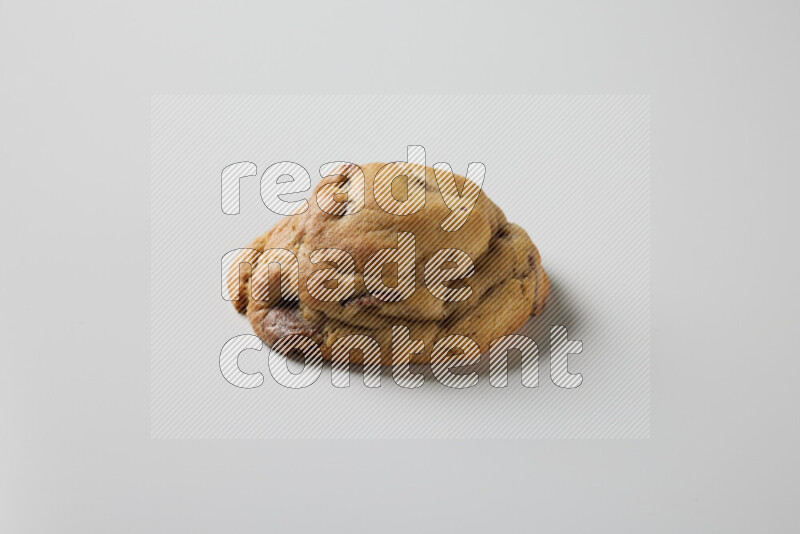 a chocolate chip cookie on a white background