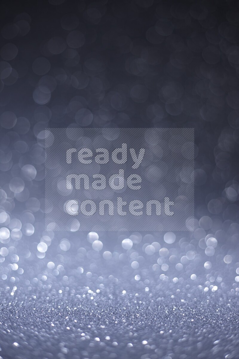 Silver glittery bokeh background