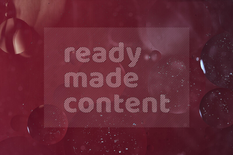 Close-ups of abstract oil bubbles on water surface in shades of red