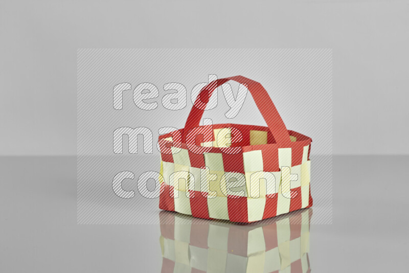 Origami easter basket on grey background
