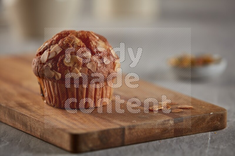 Almond cupcake on a wooden board