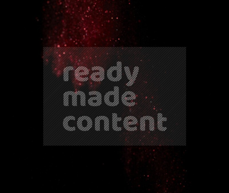 Red glitter powder isolated on black background