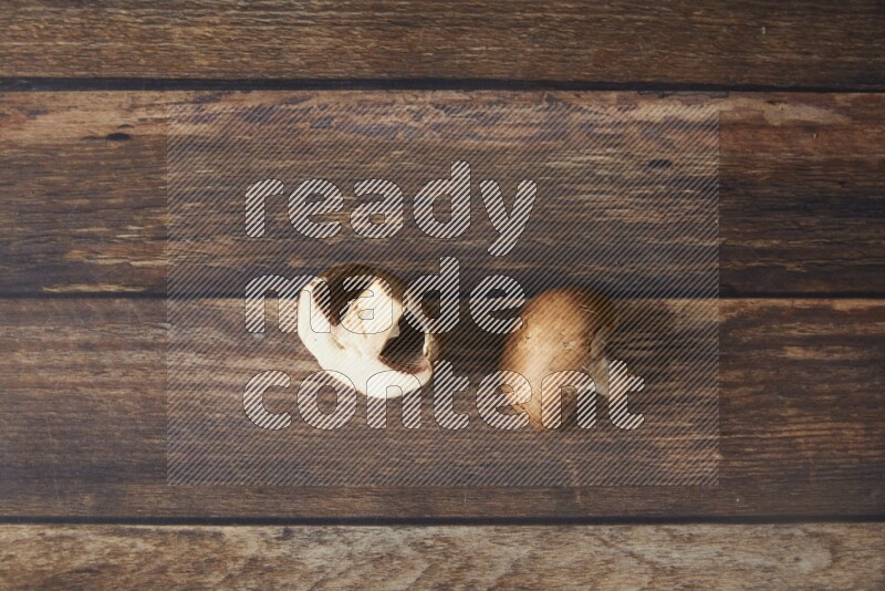 small fresh Cremini mushrooms topview  on wooden  background