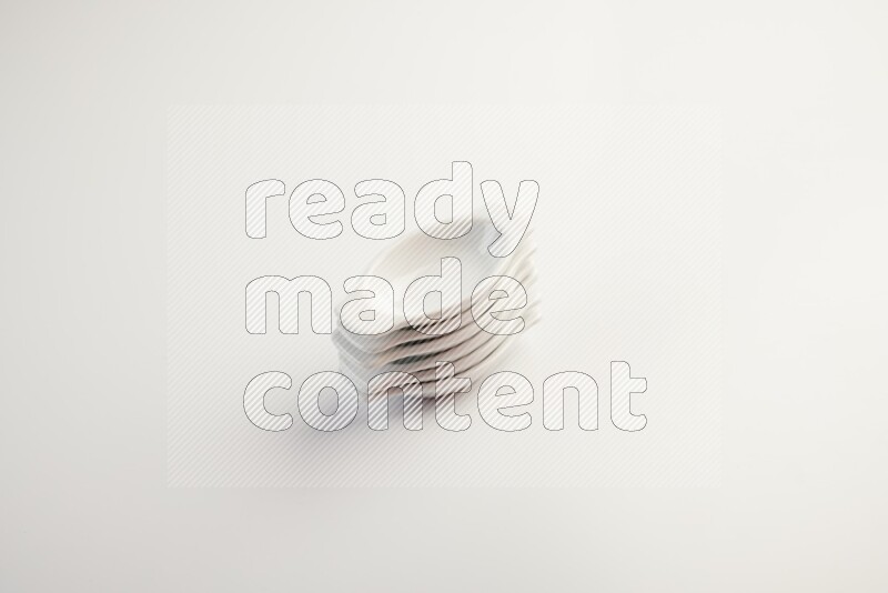 white ceramic oval sauce dish on white countertop