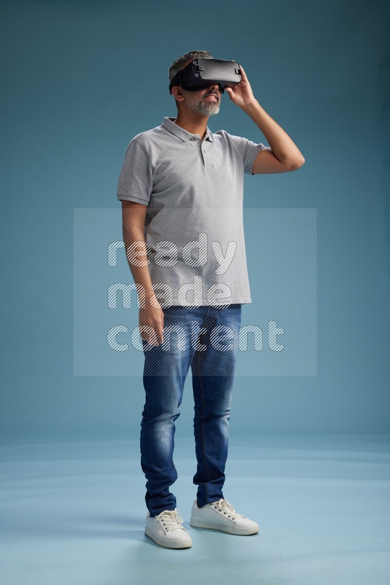 Man Standing Gaming with VR