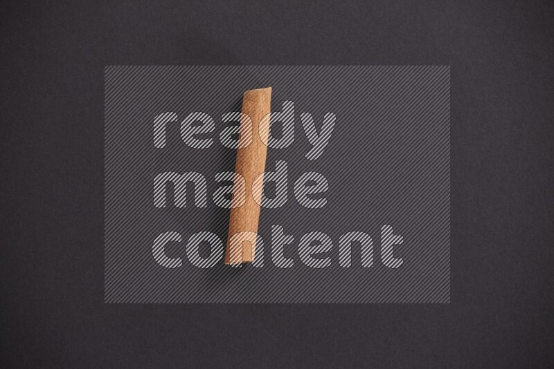 Cinnamon stick on black background