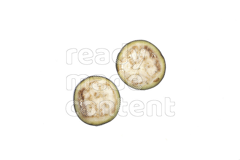 Eggplant slices on illuminated white background
