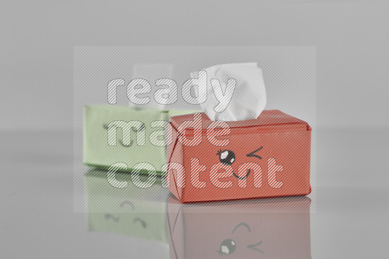 Origami tissue box on grey background