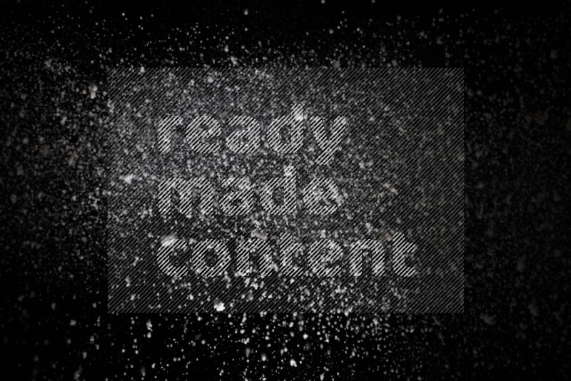 Snow spray on black background