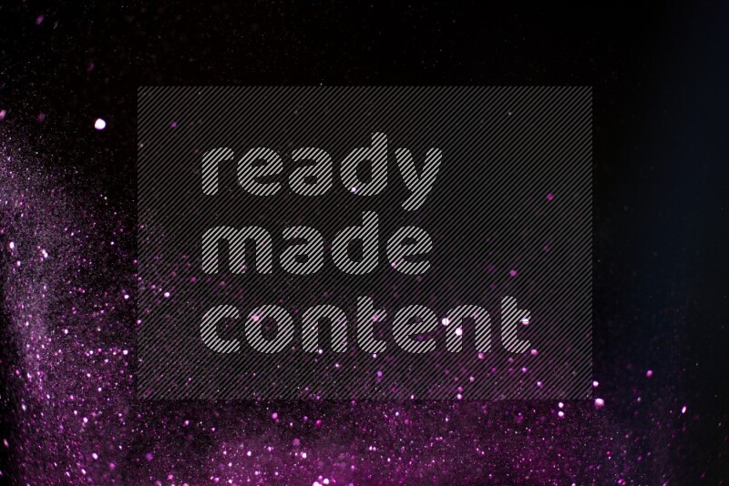 Pink glitter powder isolated on black background