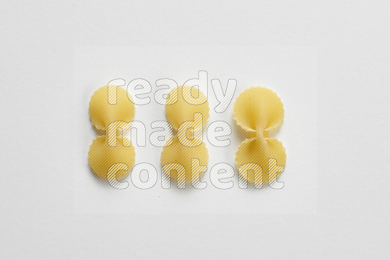 Fiocchi pasta on white background