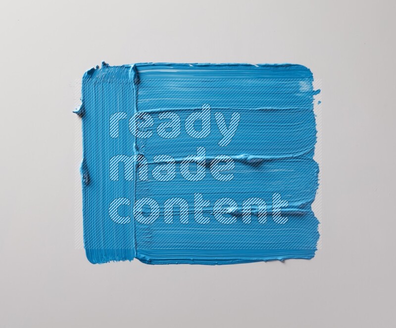 Multi blue straight brush strokes in different shapes on a white background