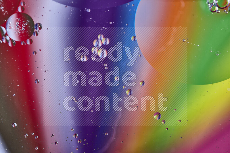 Close-ups of abstract oil bubbles on water surface in multicolors