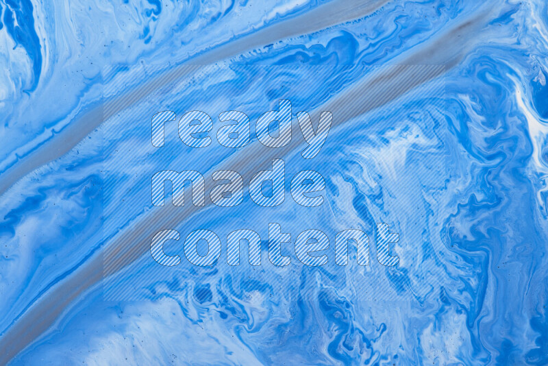 Abstract colorful background with mixed of white and blue paint colors