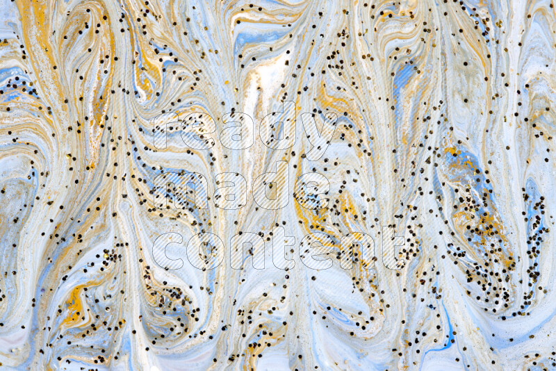 Abstract colorful background with mixed of blue, white and gold paint colors with scattered gold glitter