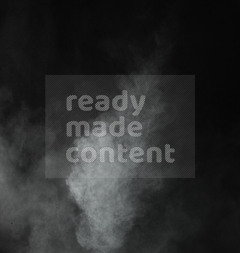 A side view of green powder explosion on black background