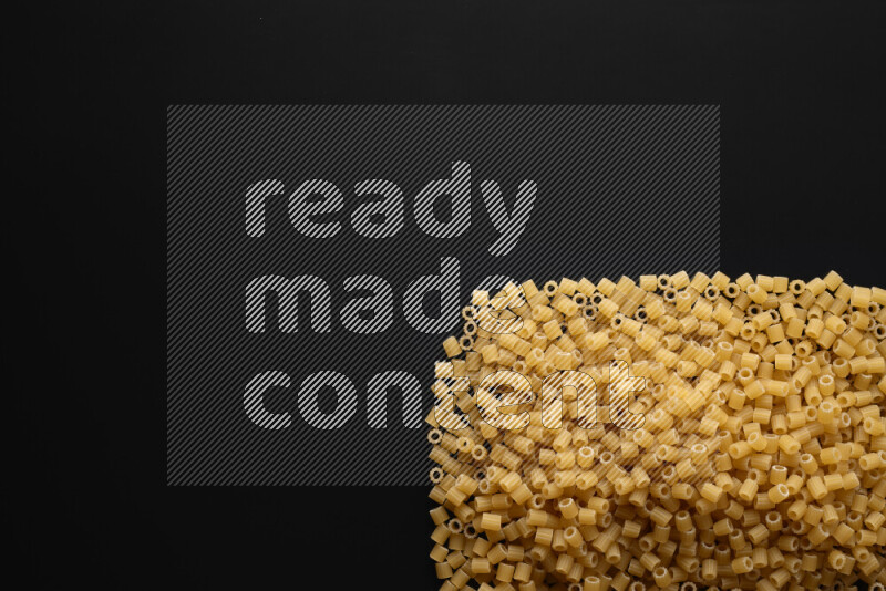 Different pasta types on black background