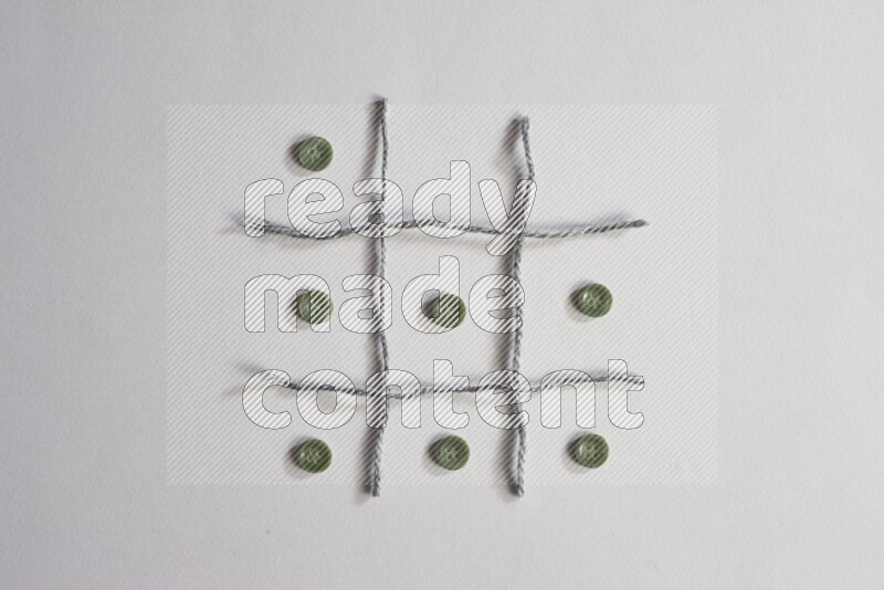 Green buttons placed on grey background