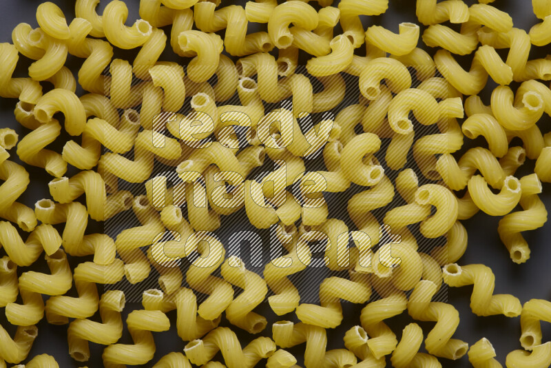 Twist pasta on grey background