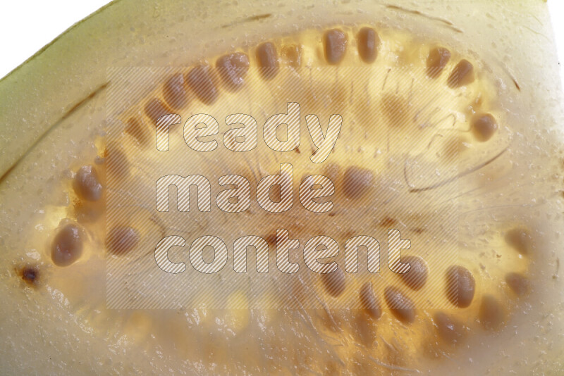 Guava slices on illuminated white background