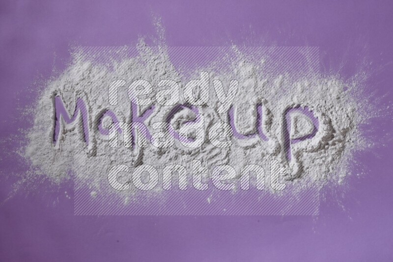 A word written with powder on purple background