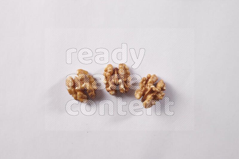 Walnuts on white background
