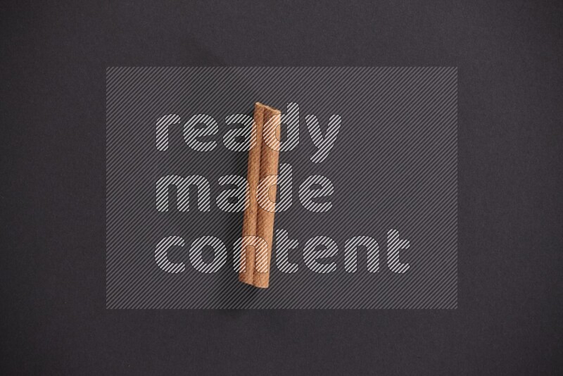 Cinnamon stick on black background