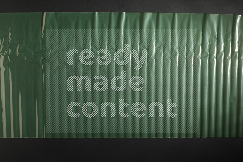 Colored plastic textures on black background